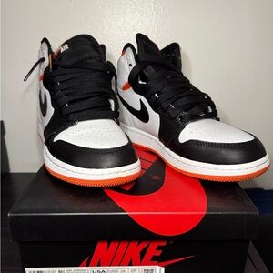 Nike Air Jordan 1 Black, White, and Orange Sneakers